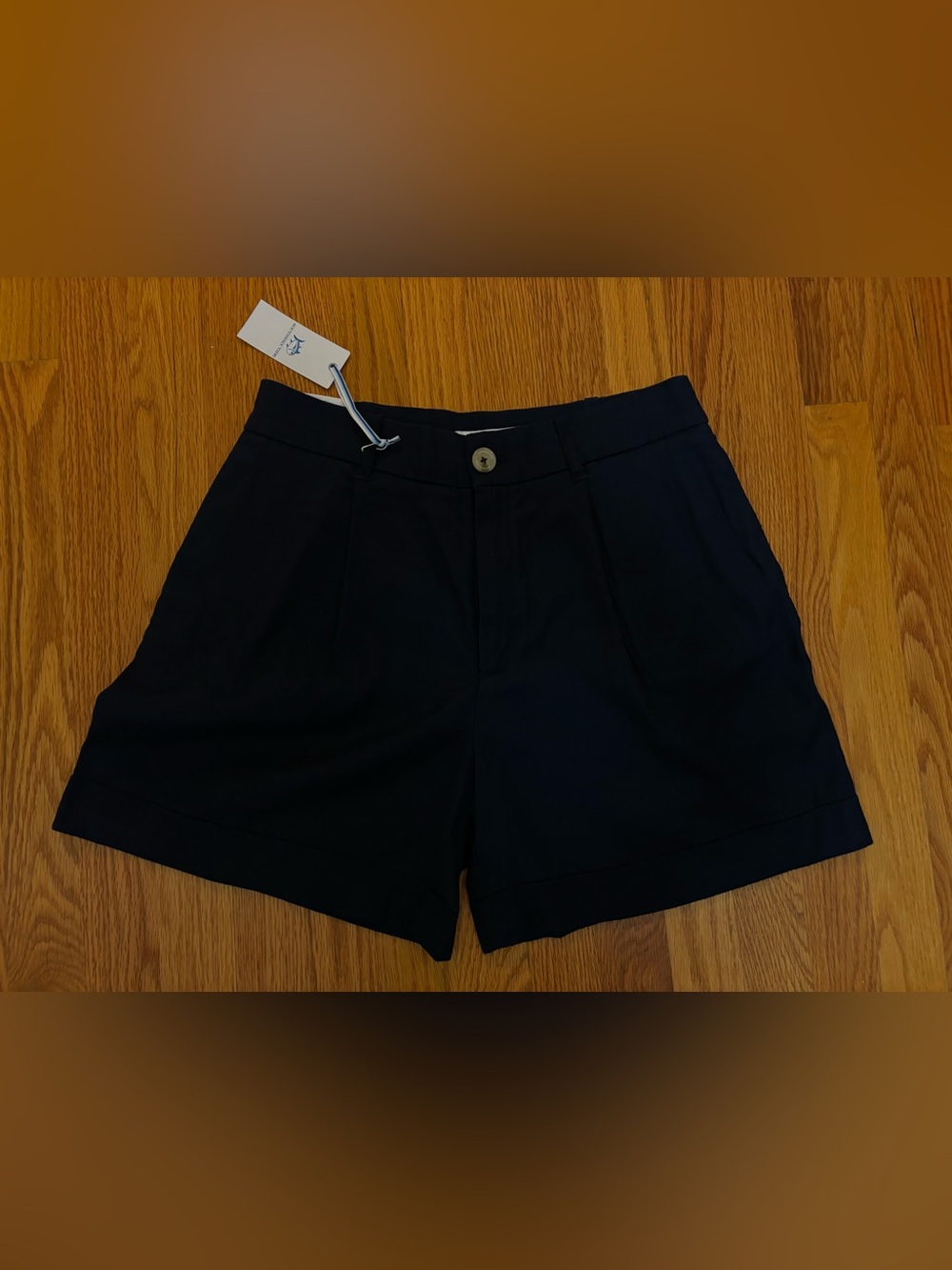 Southern Tide Navy cotton dress shorts 5” inseam.